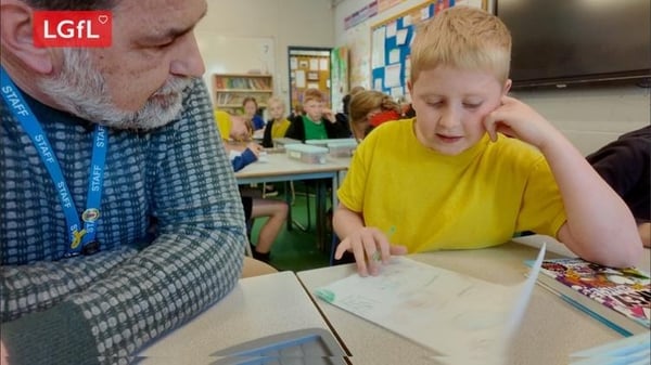 Teacher and Student discussing sketch